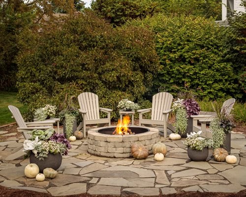 https://www.gardendesign.com/pictures/images/500x400Exact_46x0/dream-team-s-portland-garden_6/outdoor-fire-pit-with-seating-fall-fire-pit-proven-winners_17071.jpg