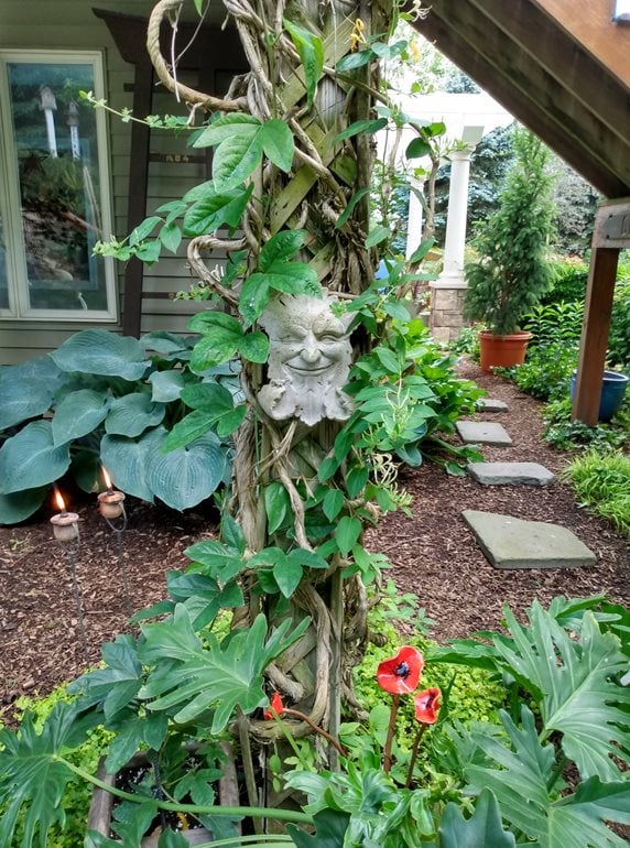 Face sculpture in garden